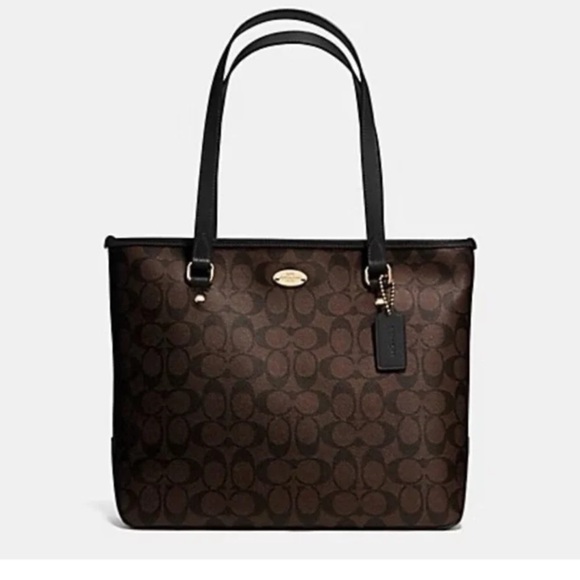 Coach Handbags - Coach Zip Top Tote Bag In Signature Canvas Black/Walnut/Gold 
Style code -F34603